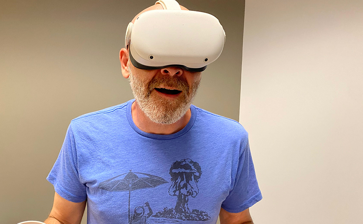 A person wearing a VR headset and experiencing the immersive Van Gogh VR experience