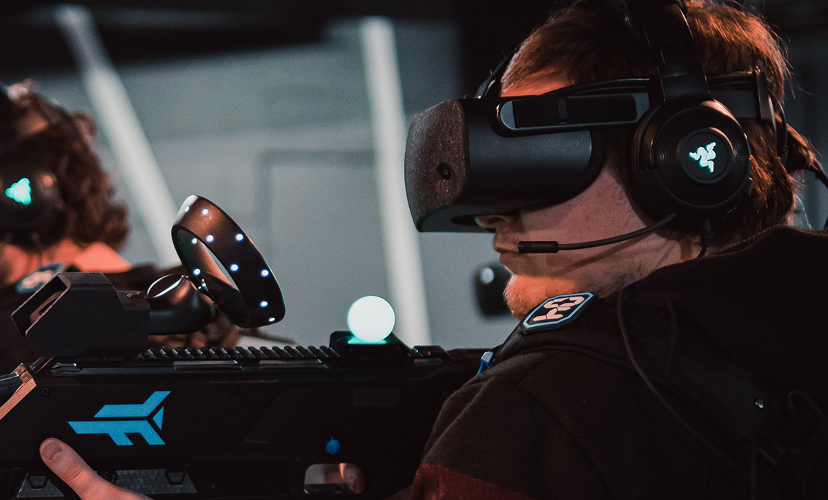 A person playing a VR game, immersed in a virtual world