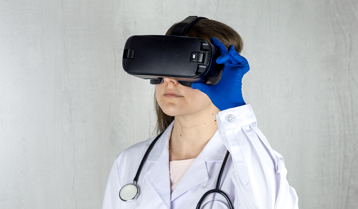 A person wearing a virtual reality headset, immersed in a virtual environment - VR and your Health